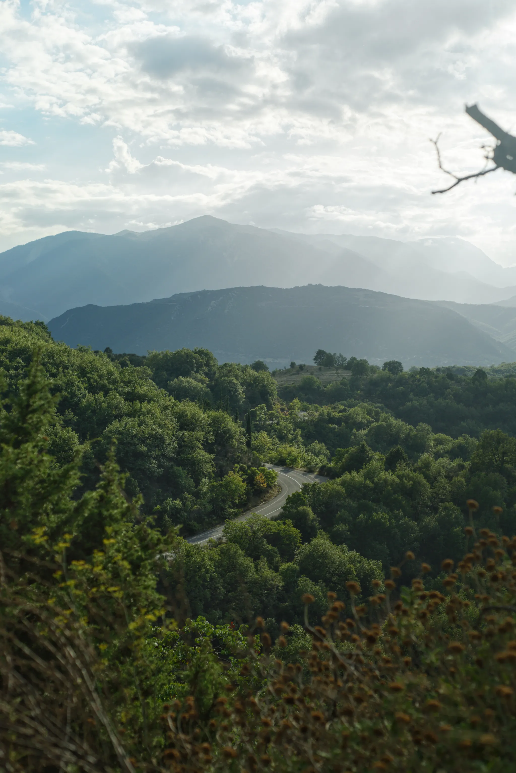 Winding roads with Mount Oiti on the horizon